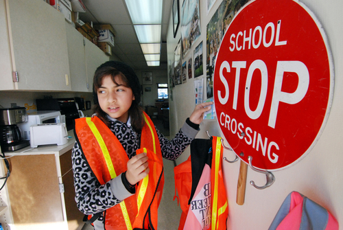 Peer mediator Esmeralda Macias stops by the team's ready station to pick up her conflict resolution materials at Virginia Rocca Barton Elementary School in Salinas.