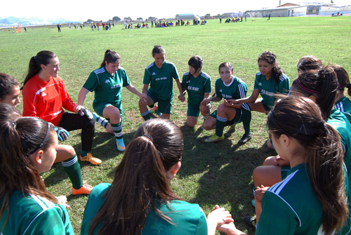 The U-17 Real Salinas Thundergirls say a prayer together before their final tournament game of 2014 versus San Bruno at Bolsa Knolls Middle School in Salinas.